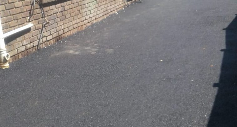 Tar tennis courts resurfaces