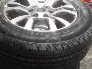 brand new 265/60/18 continental tyres and rims for sale .