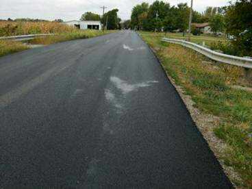 Tarring Surfaces /driveways and parking areas