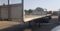 Top Trailer Superlink Flatdeck Trailer for sales front and rear.