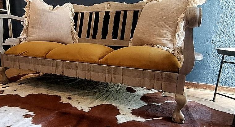 Refurbished solid imbuia wood three-seater occasional couch