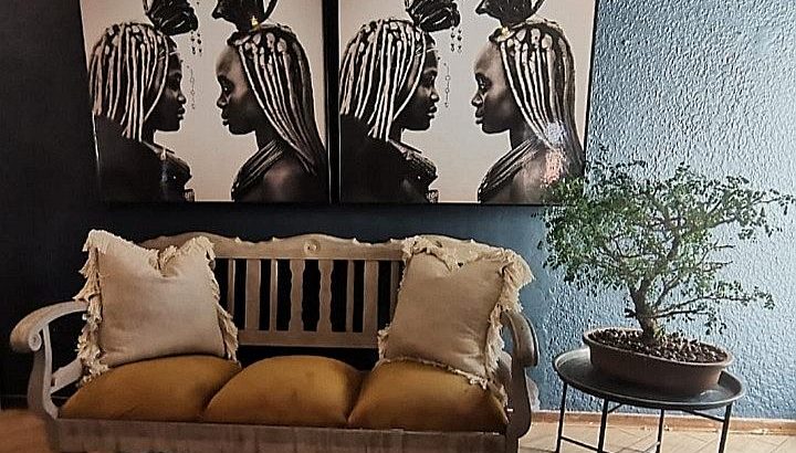 Refurbished solid imbuia wood three-seater occasional couch