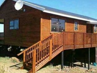 tom log homes and design