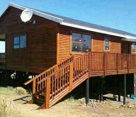tom log homes and design