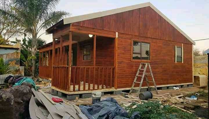 tom log homes and design