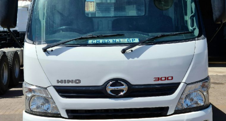 2013 Hino 300-915 dropside Truck for sale.