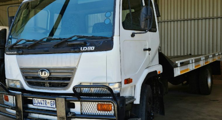 2003 Nissan UD 80 Rollback with winch Truck for sale. Selling wit