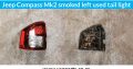 Jeep Compass smoked left & right used tail light