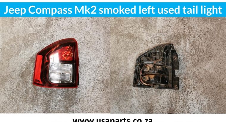 Jeep Compass smoked left & right used tail light