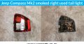 Jeep Compass smoked left & right used tail light