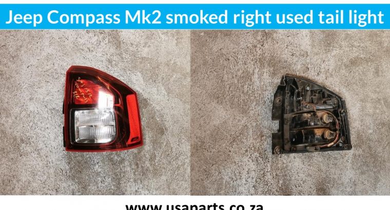 Jeep Compass smoked left & right used tail light