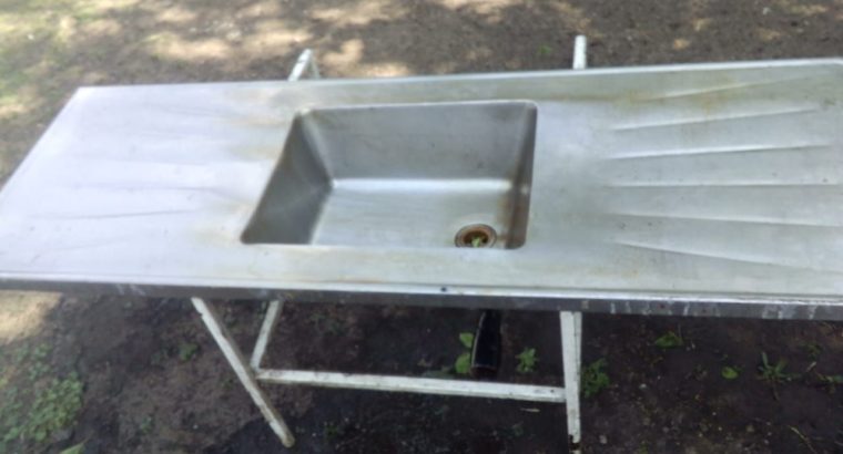 zink and window frame with burgaler bars