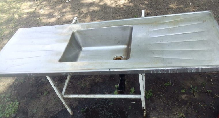 zink and window frame with burgaler bars
