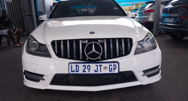 Pre-owned 2014 Mercedes Benz C-180 AMG with Automatic Transmissio