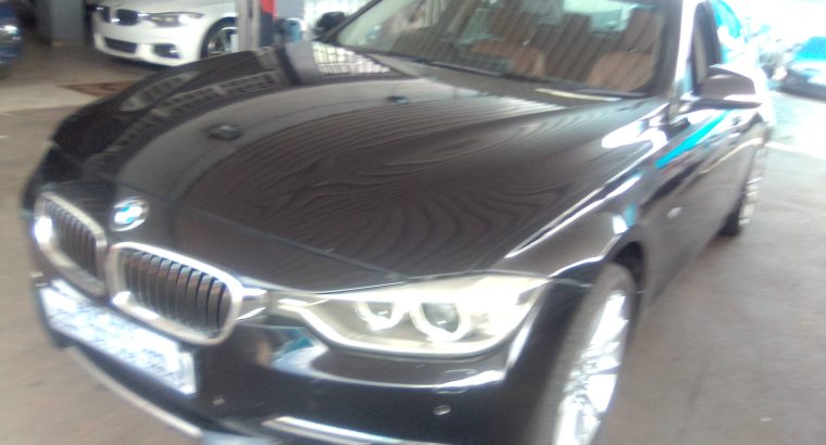 Pre-owned 2012 BMW F-30 328i with Automatic Transmission Electr